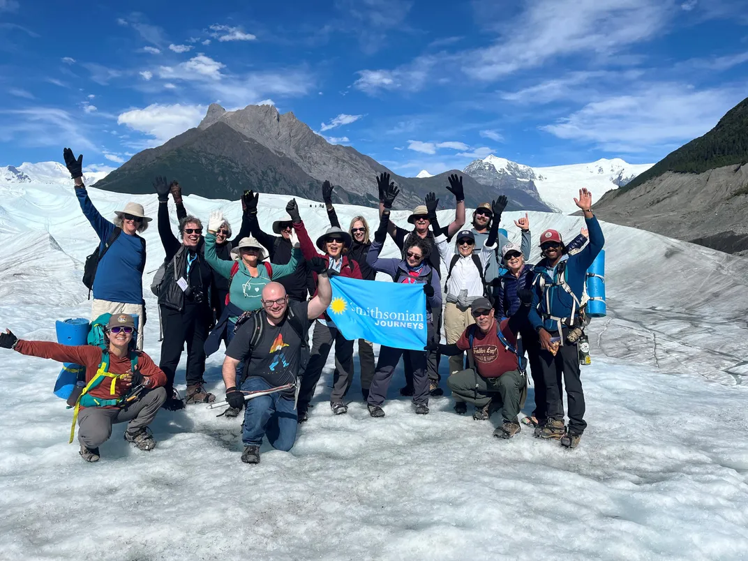 Smithsonian Journeys travelers on Root Glacier. Credit: Cheri Spink