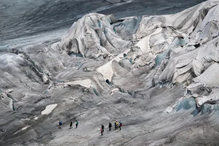 The oldest glacier in the Alps is protected by special white blankets to prevent it from melting.