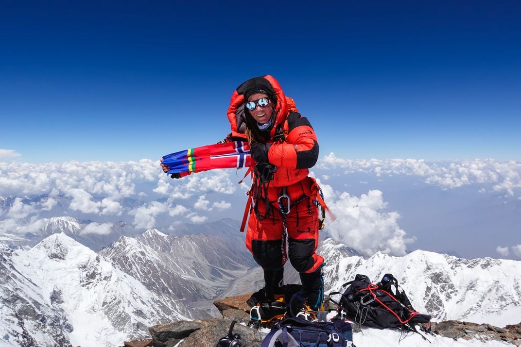 Harila posing on a mountain