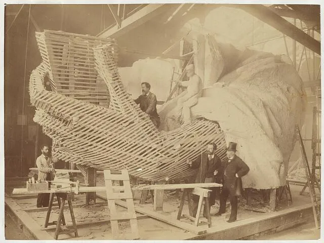 Construction of the skeleton and plaster surface of the left arm and hand of the Statue of Liberty, circa 1881-1883