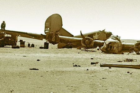 Aircraft parts were strewn by the Consolidated B-24D "Lady Be Good" as it skidded to a halt amid the otherwise emptiness of the desert.