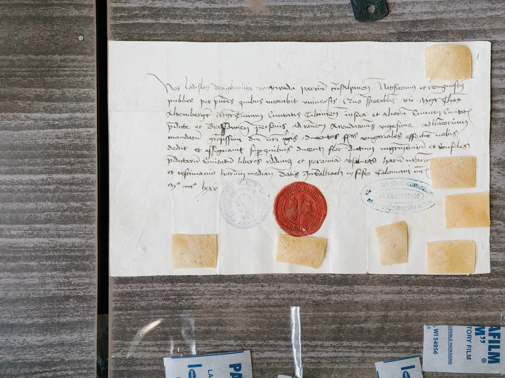 testing being done on ancient manuscript for chemical traces