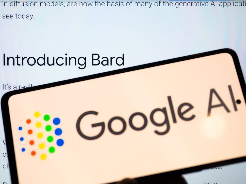 A phone that reads Google AI in front of a screen with the words "introducing bard"