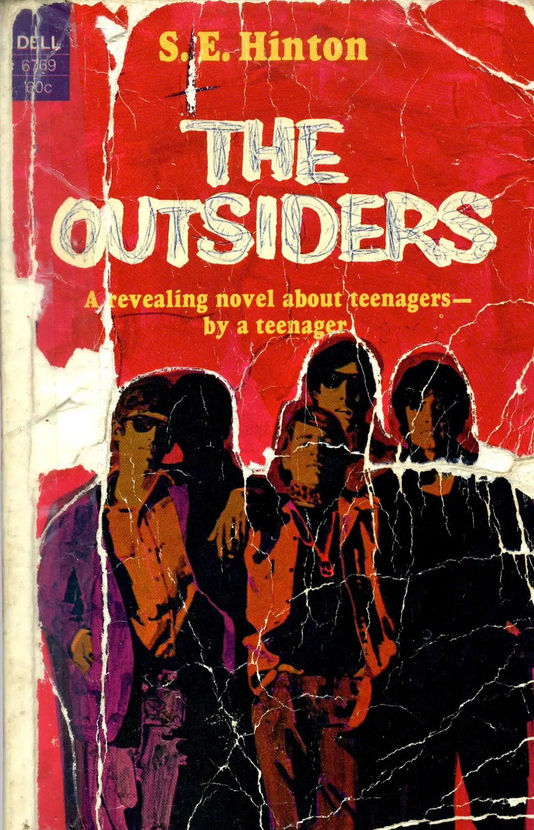 The original paperback cover of The Outsiders​​​​​​​