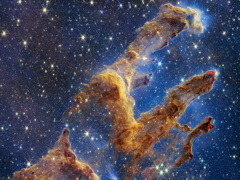 the pillars of creation—gas clouds in space that form pillars like three fingers
