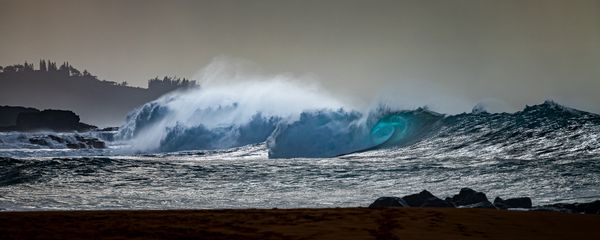 Dramatic light over large surf on the North Shore of Kaua'i thumbnail