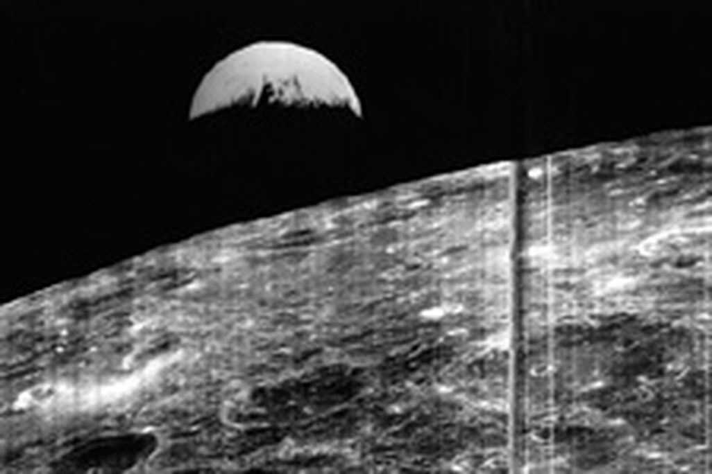 Two years before Apollo 8, Lunar Orbiter 1 showed us how Earth looked from the moon.