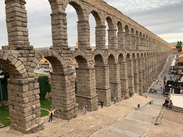 Under the arches of the aqueduct in Segovia thumbnail