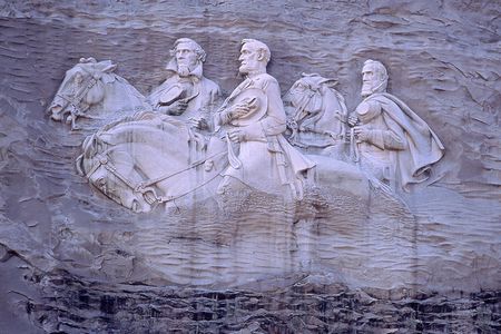 Stone Mountain Confederate Memorial features General Robert E. Lee, Stonewall Jackson and Jefferson Davis—and has stirred up controversy in Georgia for years.