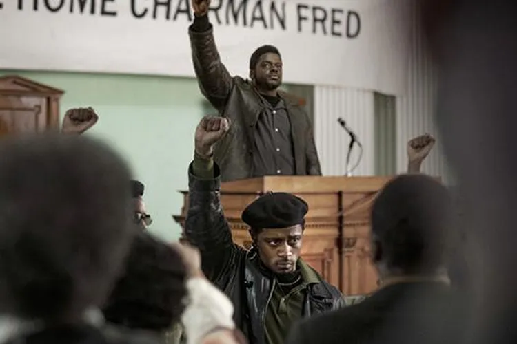 Movie Hampton and O'Neal raise their fists at a rally (mobile)
