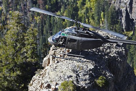 A student holds his Kiowa atop a precarious perch about 500 feet above the ground. 