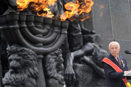 Simcha Rotem speaking in front of the Warsaw Ghetto Uprising memorial during the revolt anniversary ceremonies in 2013.