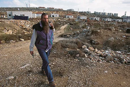 Menachem Brody (shown here at Elon Moreh) leads tours to biblical sites on the West Bank.