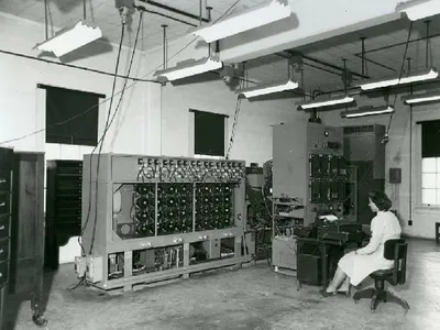 A woman operates an early decryption machine for the NSA’s progenitor