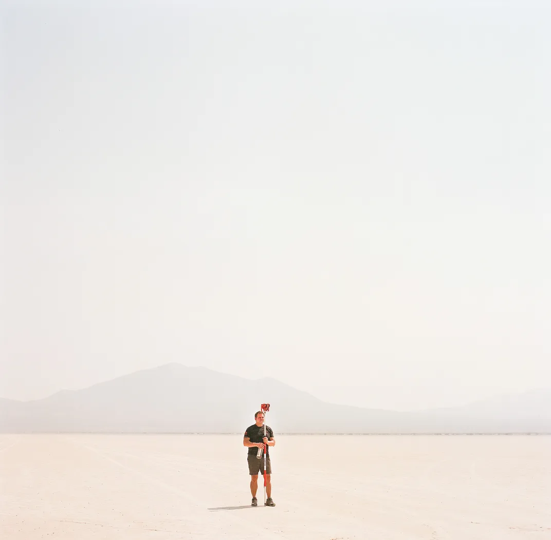 Kevin Strother holding a reflector