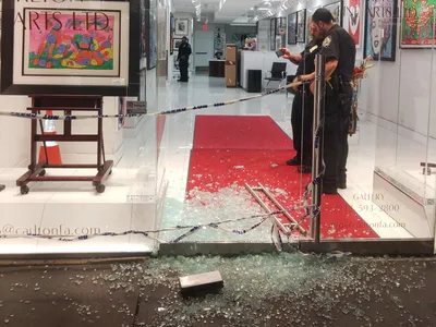 Thieves used a hammer to shatter the front door to the gallery and made off with a Chagall print.