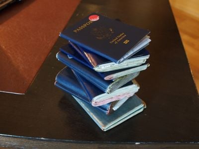 Eric Oborski's passports. The thickest one, which he used from 1997 to 2007, contains 331 pages.