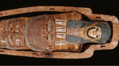 Within this sarcophagus and underlying wrappings is the mummified body of a man who died 2,000 years ago (150 B.C.-50 A.D.)