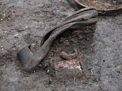 Woman's shoe found at the site of the March 1945 massacre
