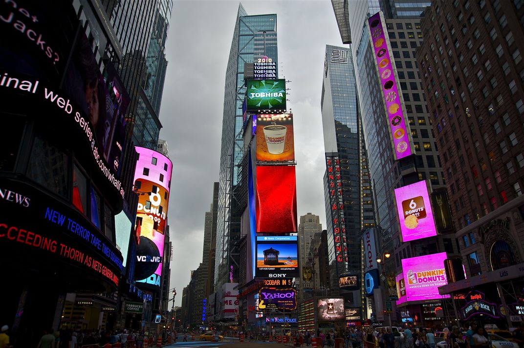 Dusk falls on TImes Square, NYC as the lights begin to come alive ...