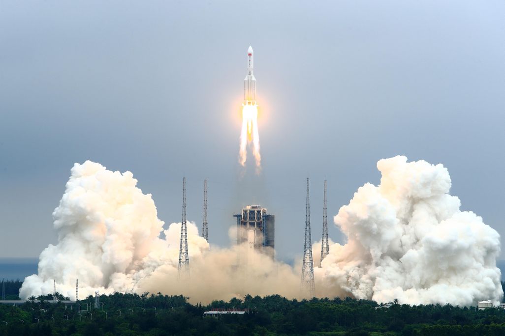 A photo of the first module of the Chinese Space Station blasting off on a rocket to space. 