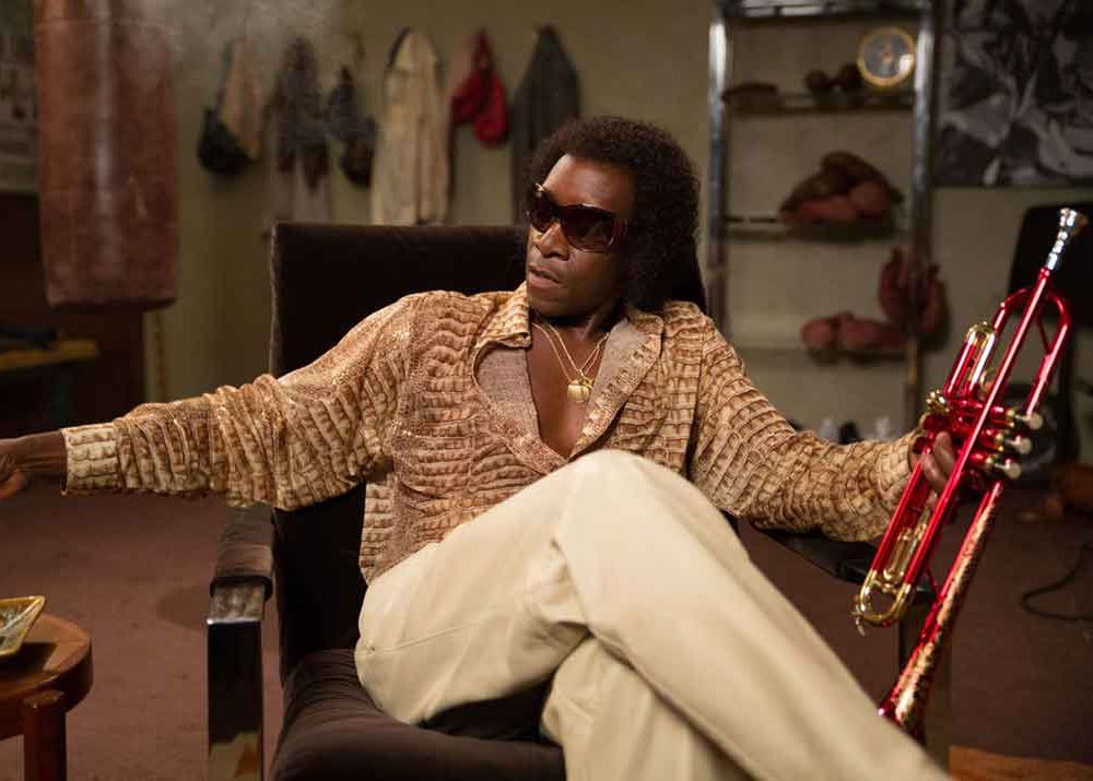 Don Cheadle as Miles Davis