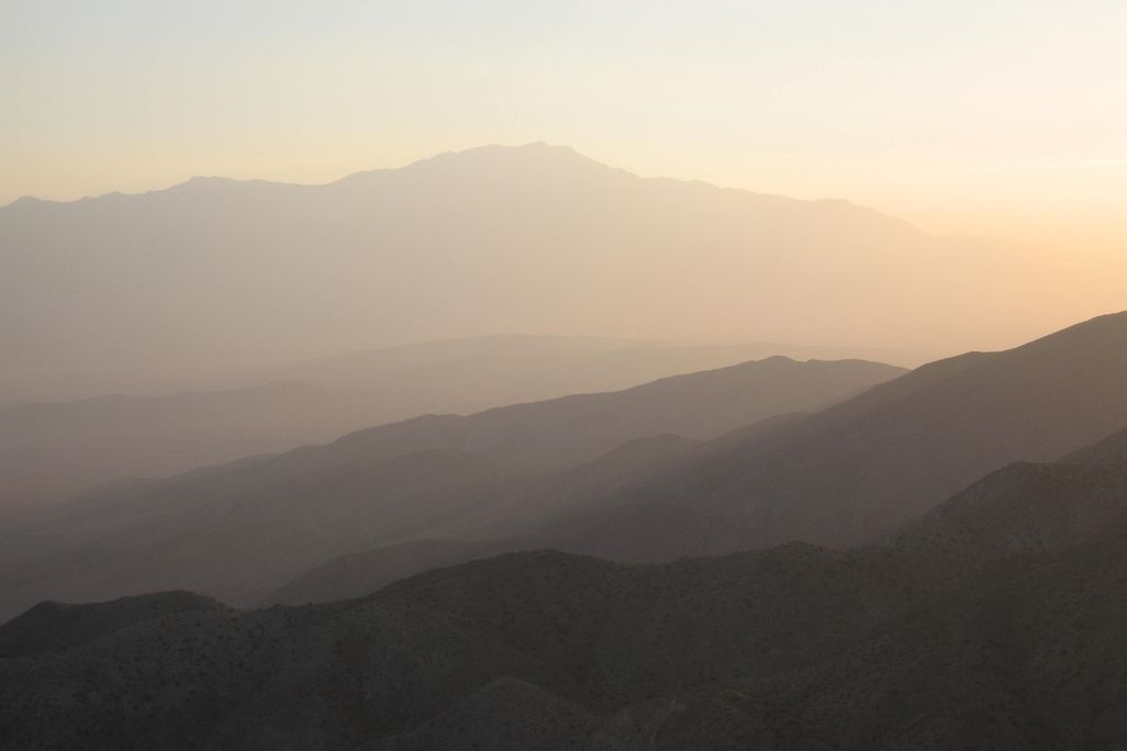 Hazy sunset with mountains