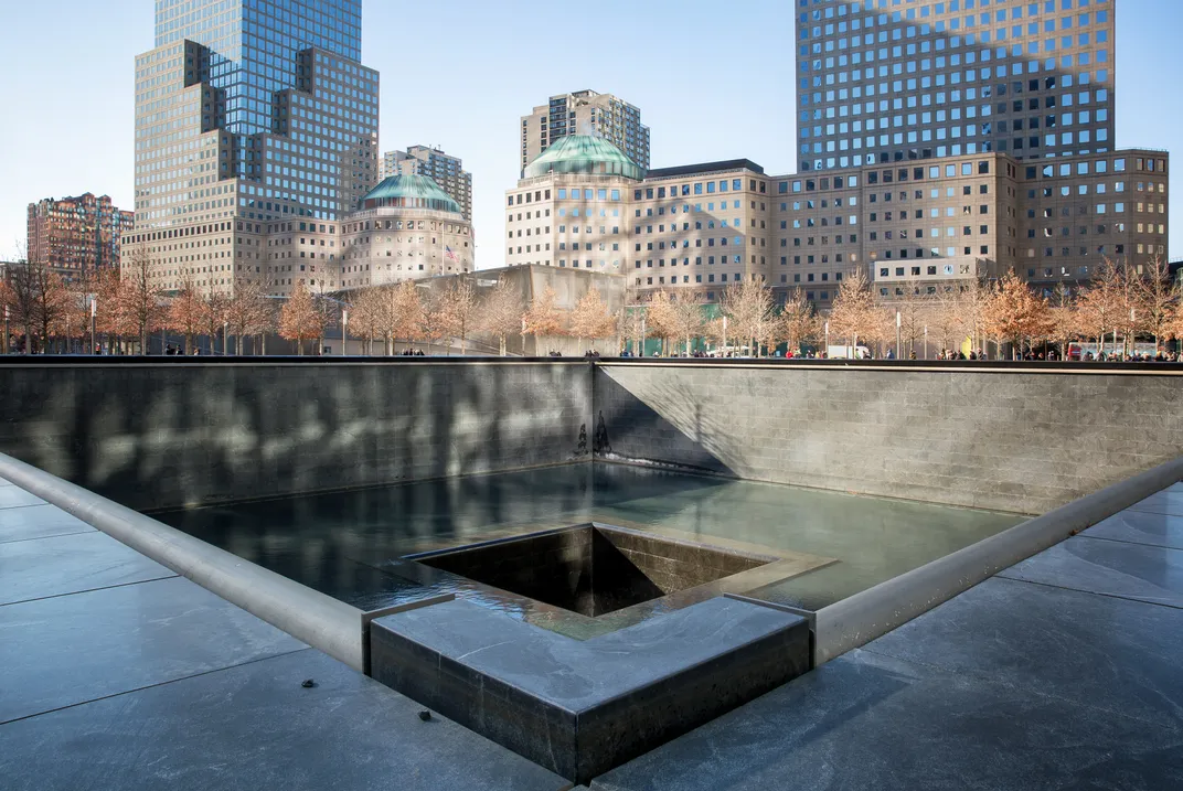 reflecting-on-the-memorial-twin-towers-nyc-smithsonian-photo