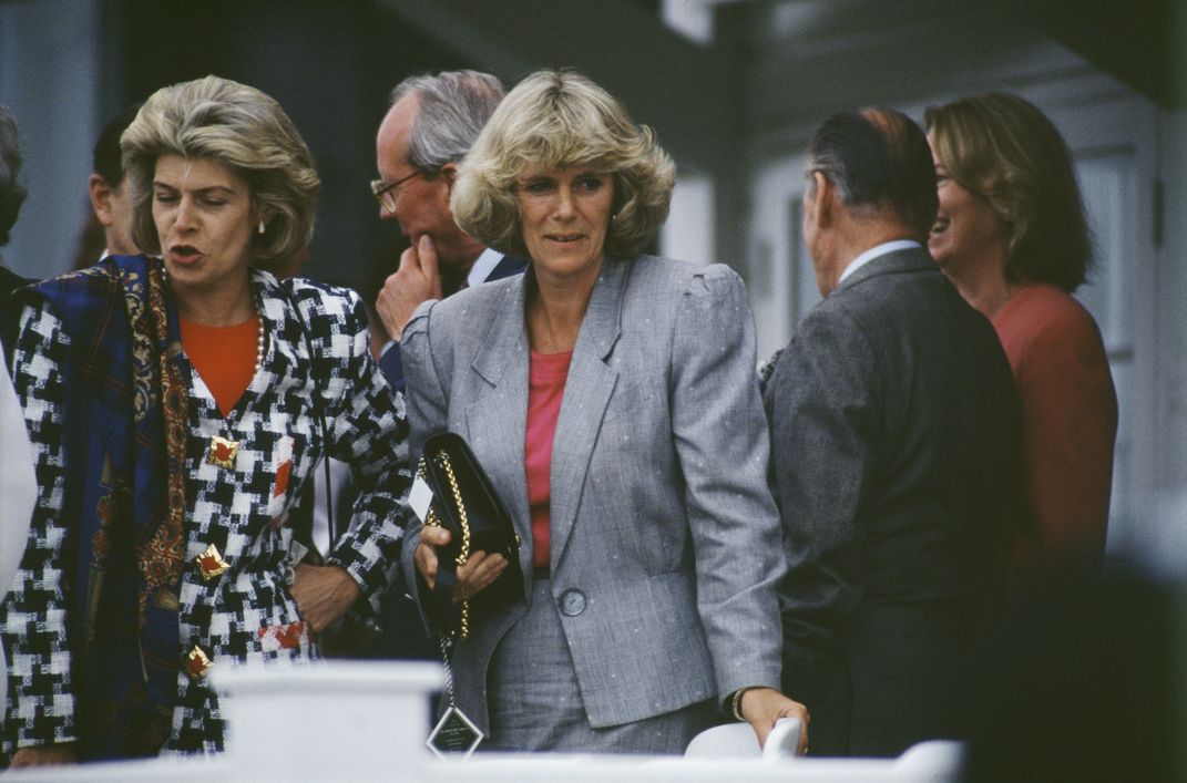 Camilla Parker Bowles (center, in gray jacket) at a polo match in June 1992