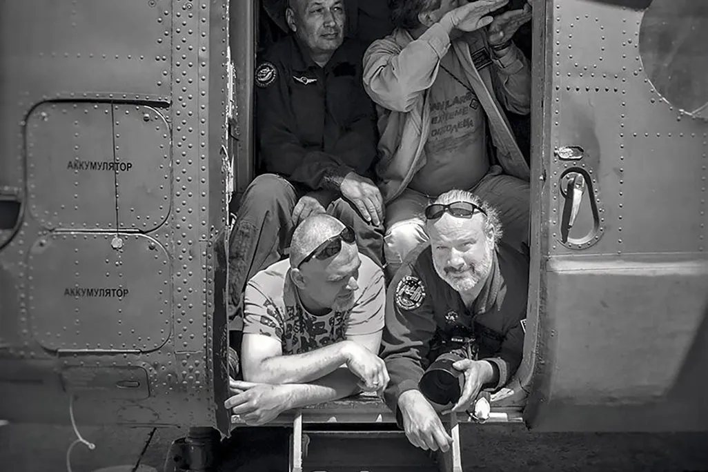 Bill Ingalls and others in helicopter