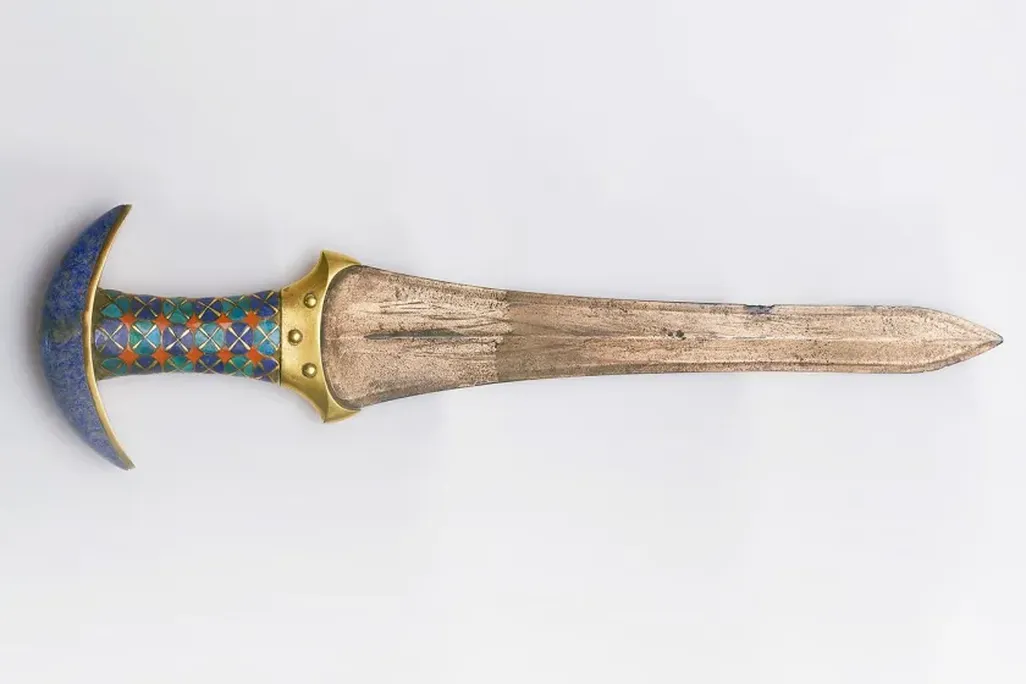 A dagger against a white backdrop