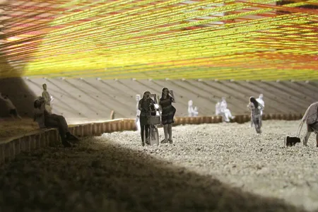 The woven courtyard will feature wading pools and a colorful kaleidoscope of ropes. 