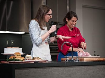 At the National Museum of American HIstory's demonstration kitchen, chefs like Chef Lynne Just of Sur La Table (above) prepare dishes, while food historian Ashley Rose Young engages them in conversations about the history and significance of the food and its traditions.