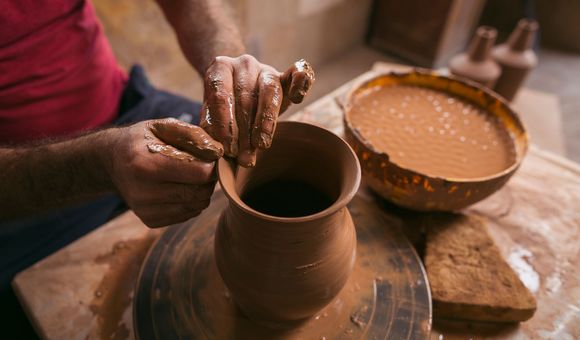 Vahagn working on a clay jug. (Photo by Narek Harutyunyan, My Armenia Program)