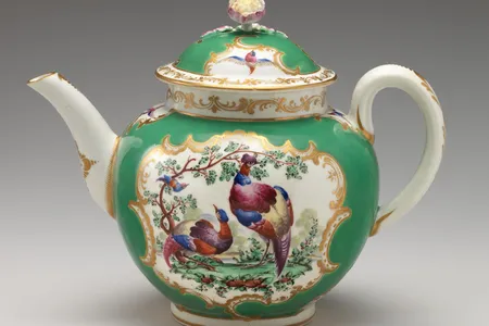 This porcelain pot with enamel decorations is one of 100 teapots on display in the Met's updated British Galleries.