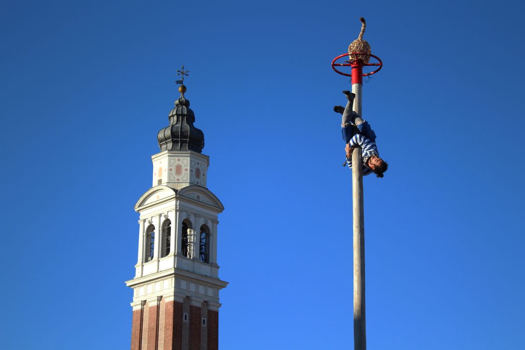 acrobat on pole