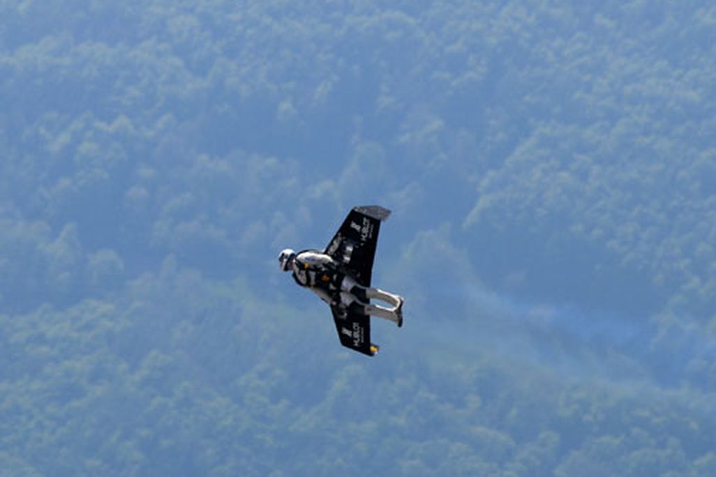 Swiss adventurer Yves Rossy crosses the English Channel in his home-built, jet-powered wing.