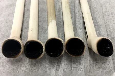 Researchers used these five replica clay pipes to "smoke" tobacco and other native plants.
