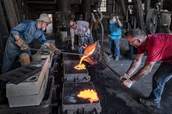 Pouring iron on a hot summer day at Knight Foundry thumbnail