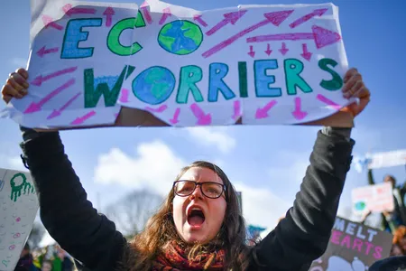 School children protest climate change outside the Scottish Parliament in 2019 as part of a worldwide demonstration.