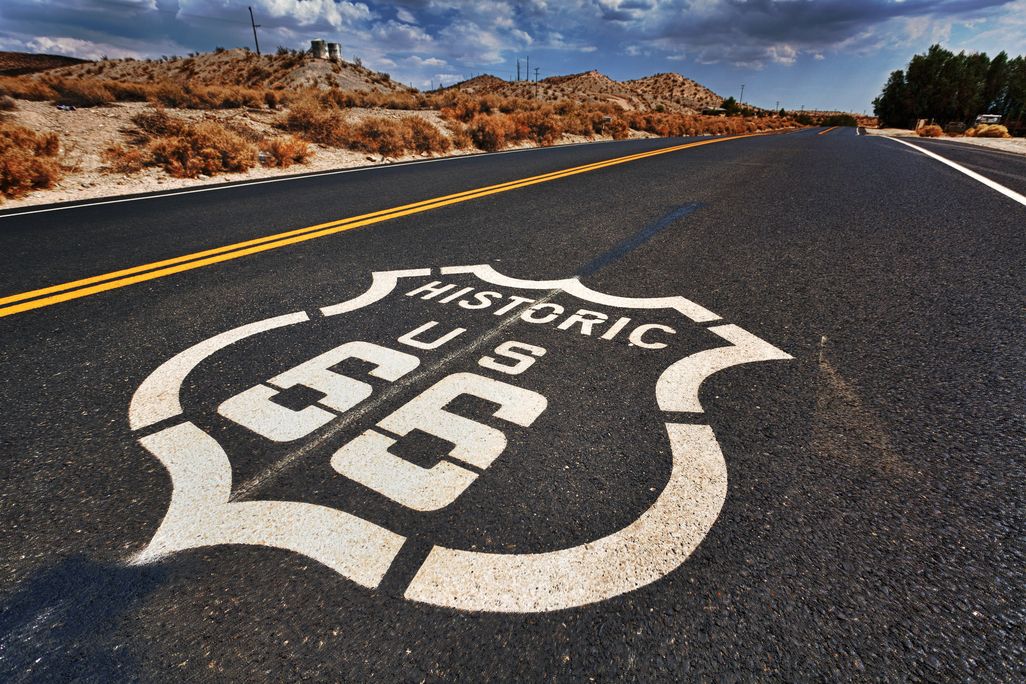 Historic U.S. Route 66 written in white paint on highway