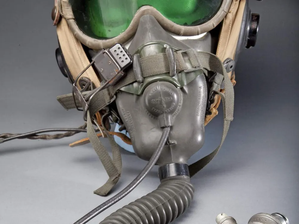 A Type A-13A oxygen mask and Polaroid goggles were worn with this helmet during many flights in 1944-1946. Made by Stefan A. Cavallo, a test pilot for the National Advisory Committee for Aeronautics (NACA).