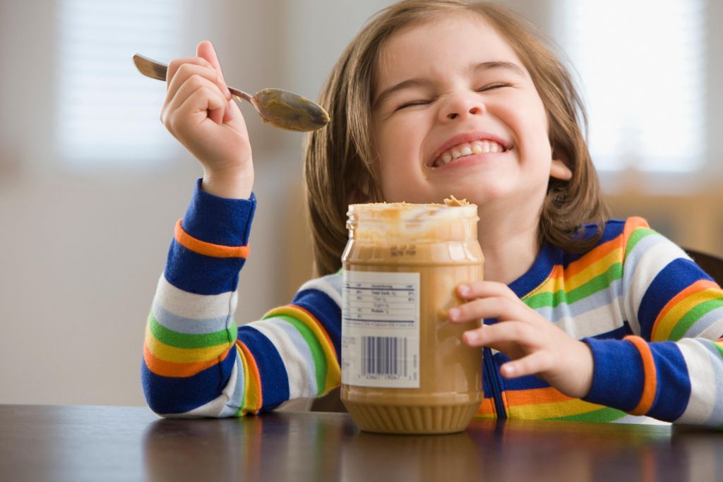 Kid Eating Peanut Butter