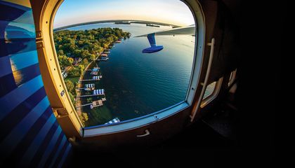 image of lake through aircraft window