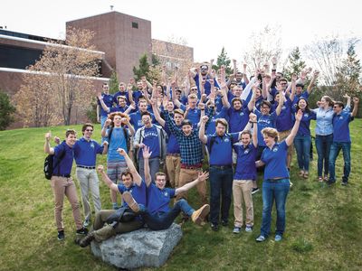 Lab rats triumphant: System leads and mission managers at the University of Buffalo campus cheer after learning that the nanosat lab got the go-ahead for three projects.