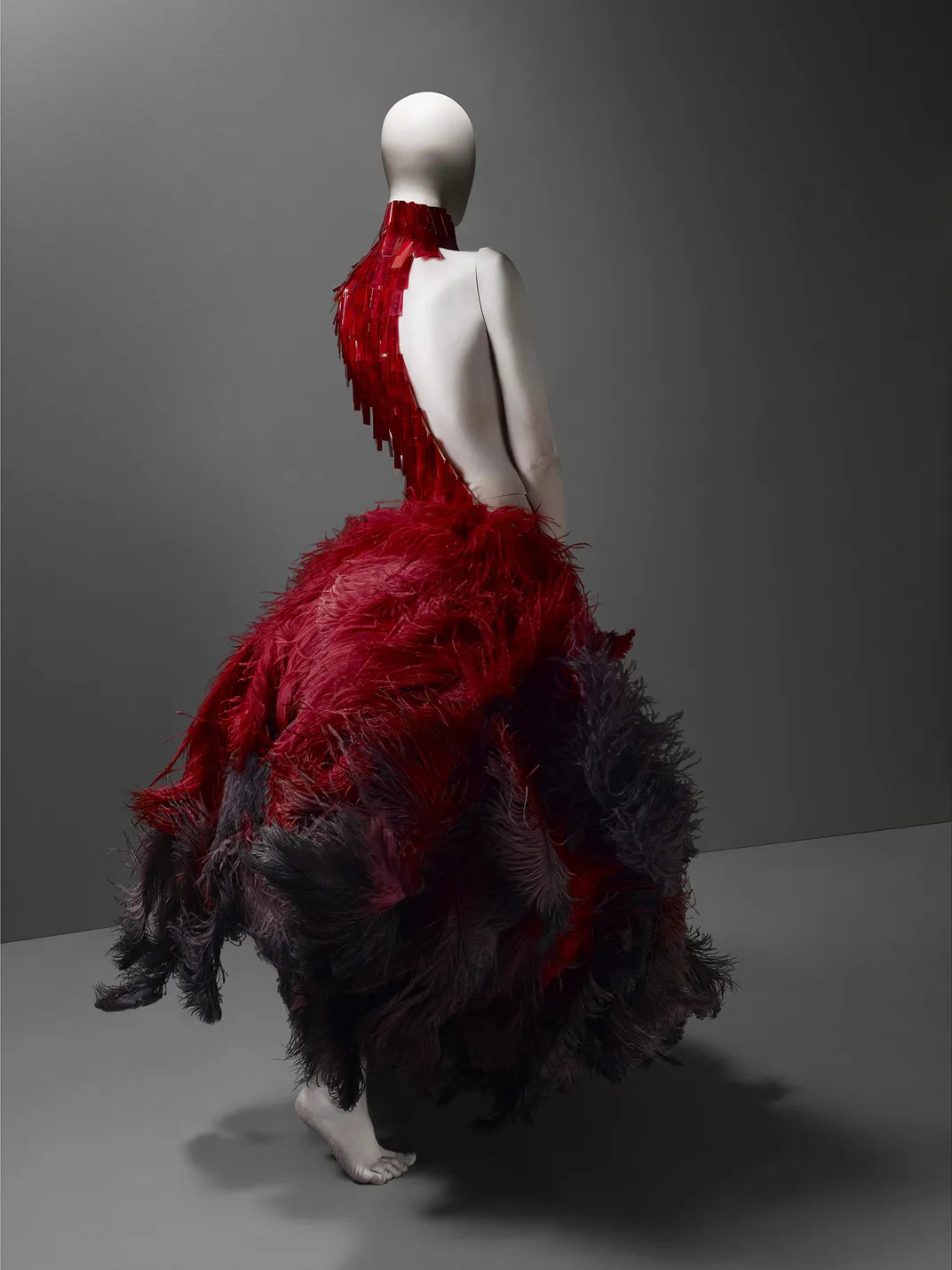 A 2001 Alexander McQueen dress with a scaly bodice crafted out of glass microscope slides