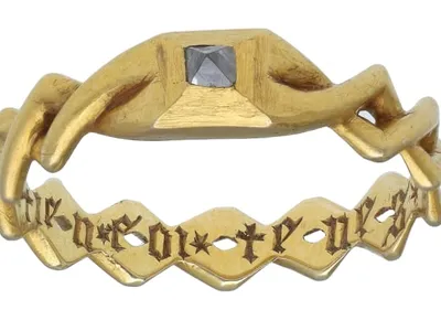 Inside the band is an inscription in French, which translates to, &quot;I hold your faith, hold mine.&rdquo;