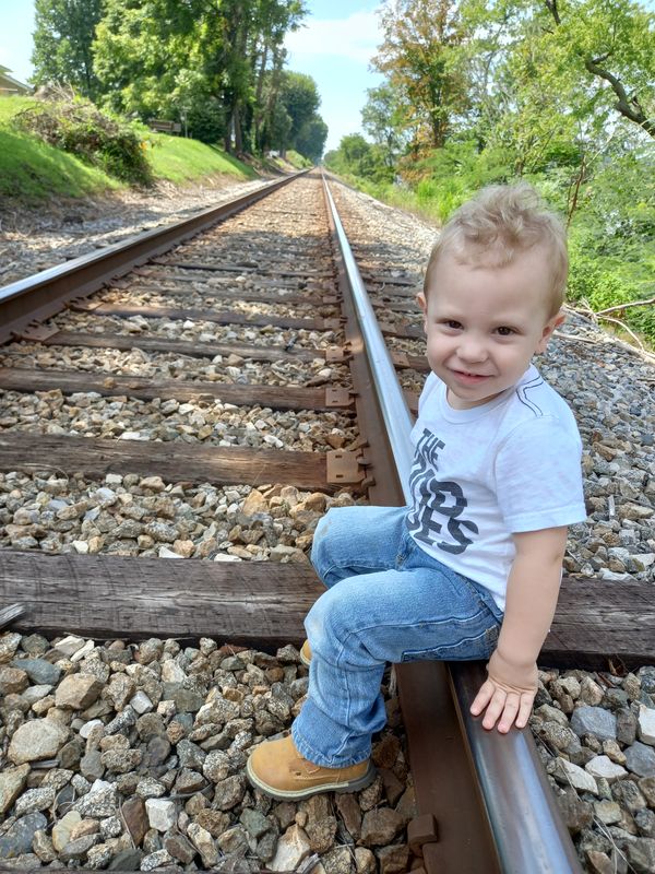 My son on the tracks. thumbnail