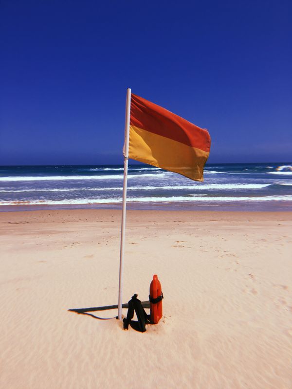A lifeguard flag and buoy thumbnail