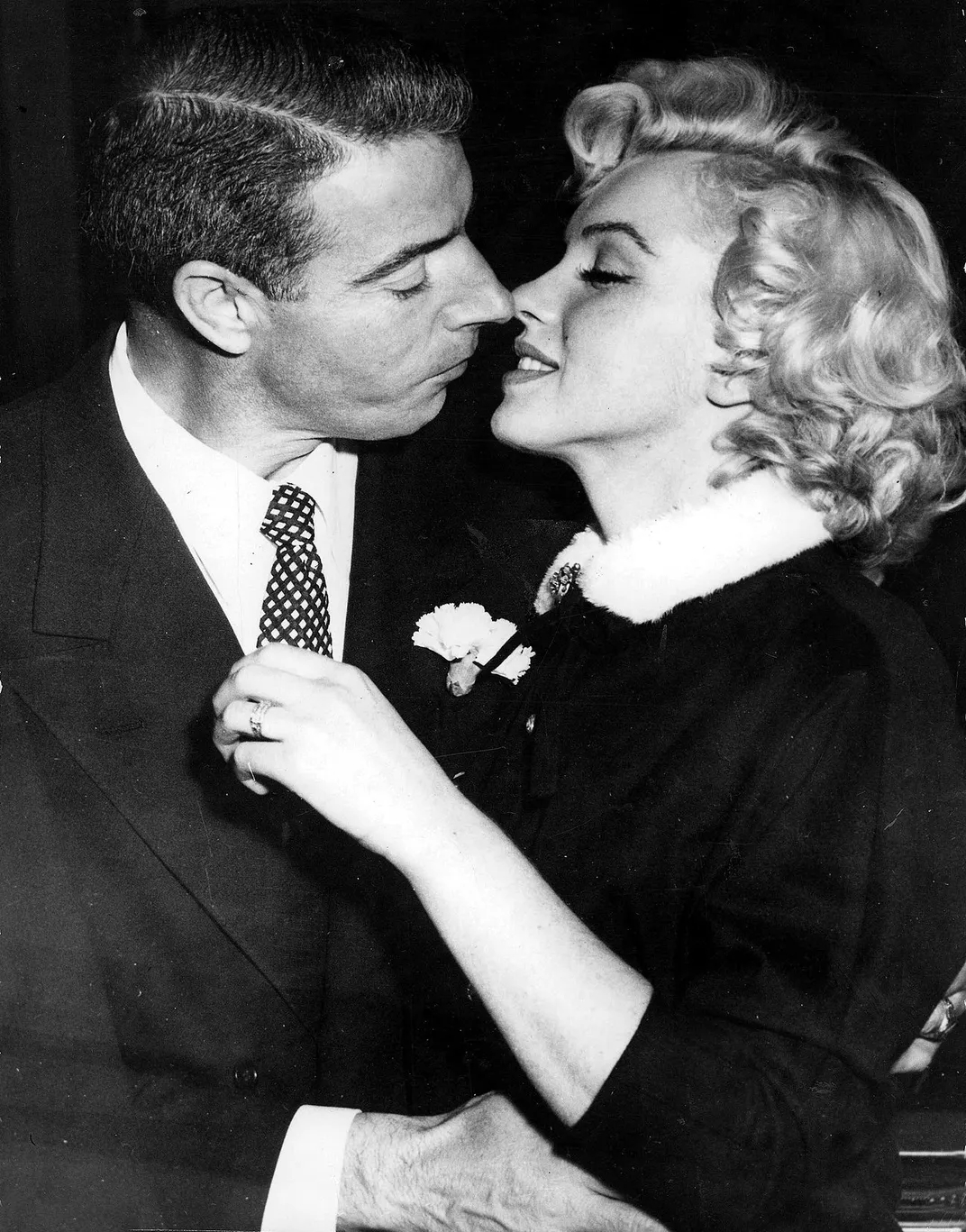 Monroe and her second husband, Joe DiMaggio, after getting married in January 1954